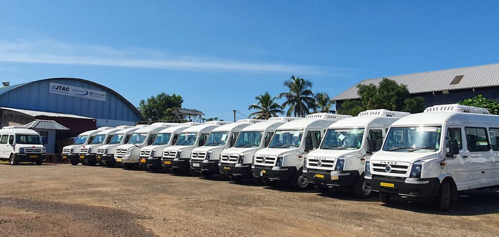Force Traveller (Formerly Tempo Traveller Vehicles fitted with JTAC Bus AC Neatly Parked in Trans ACNR Kochi Branch